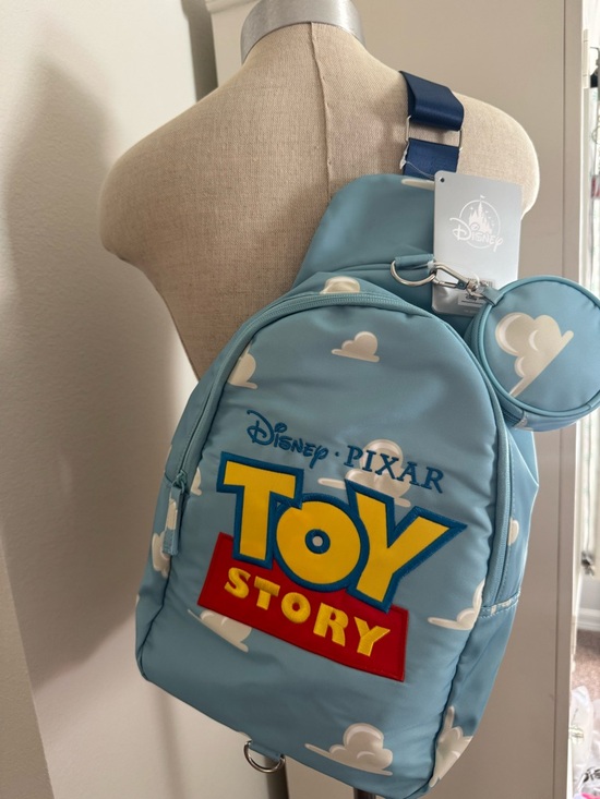 Disney Toy Story Light Blue Kids Sling Backpack with Cloud Print